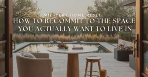 A title graphic for a blog post featuring a sunlit organic modern outdoor patio, with text that reads "Mid-Year Home Reset: How to Recommit to the Space You Actually Want to Live In."